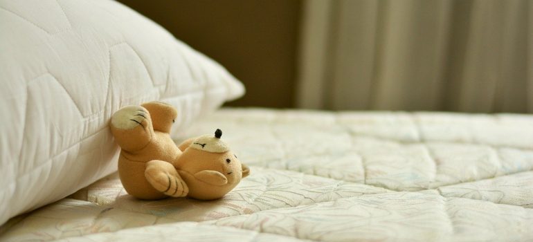 Teddy bear on a bed