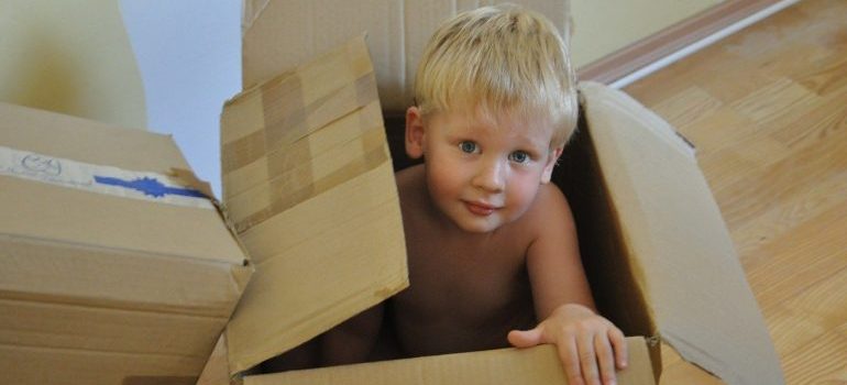 Kid in a moving box