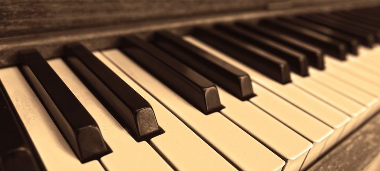 A piano, be sure your instruments are clean before storing musical instruments