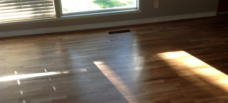 Protecting hardwood flooring during the relocation.