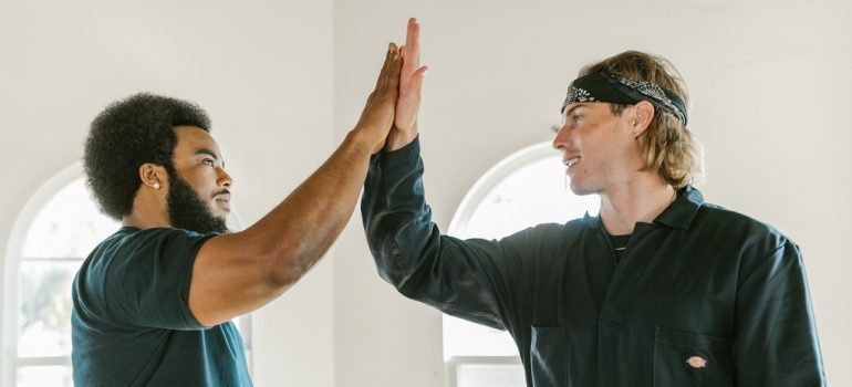 Two men having high-five